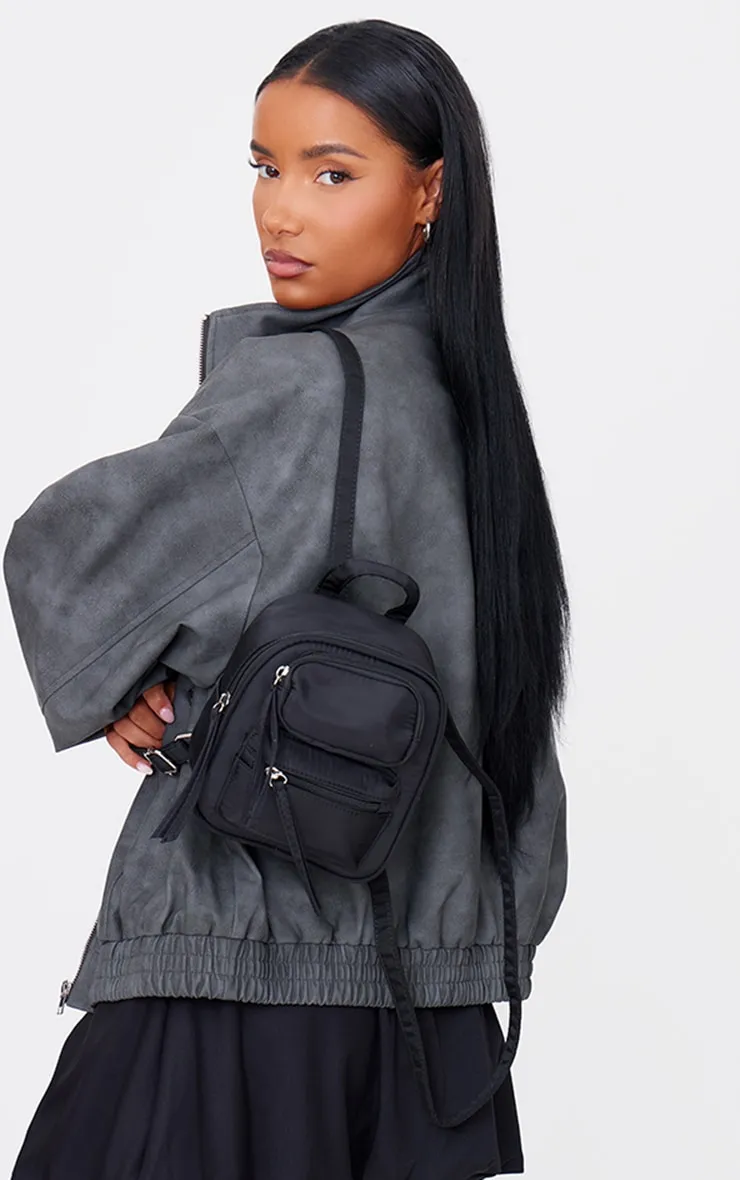 Black Nylon Pocket Mini Backpack sold by Pretty Little Thing