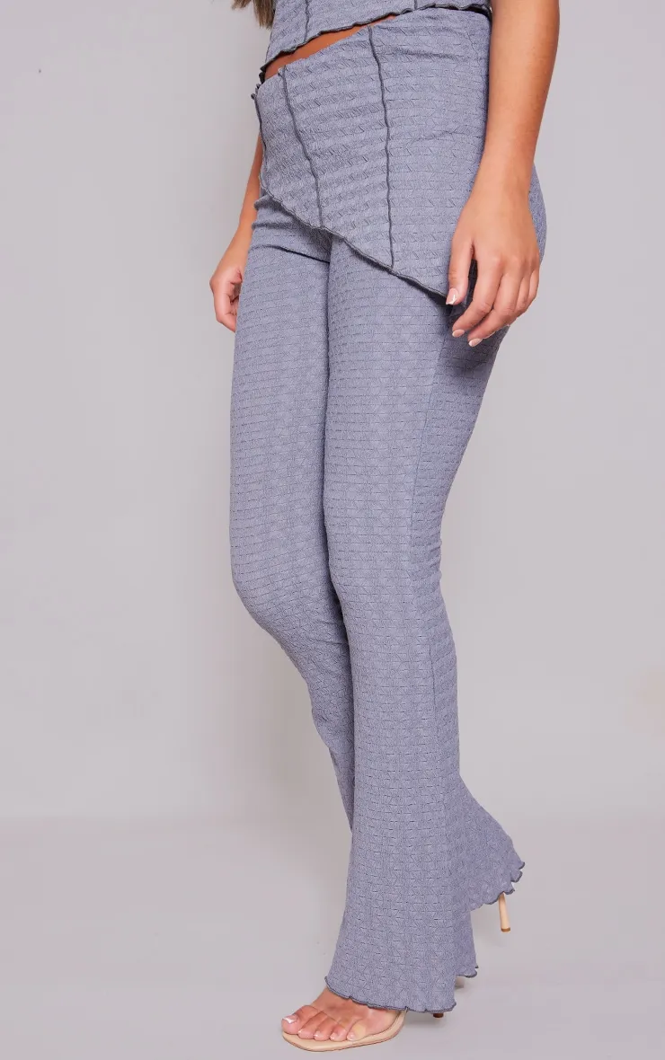 Charcoal Textured Asymmetric Flare Trousers sold by Pretty Little Thing product image thumbnail 2