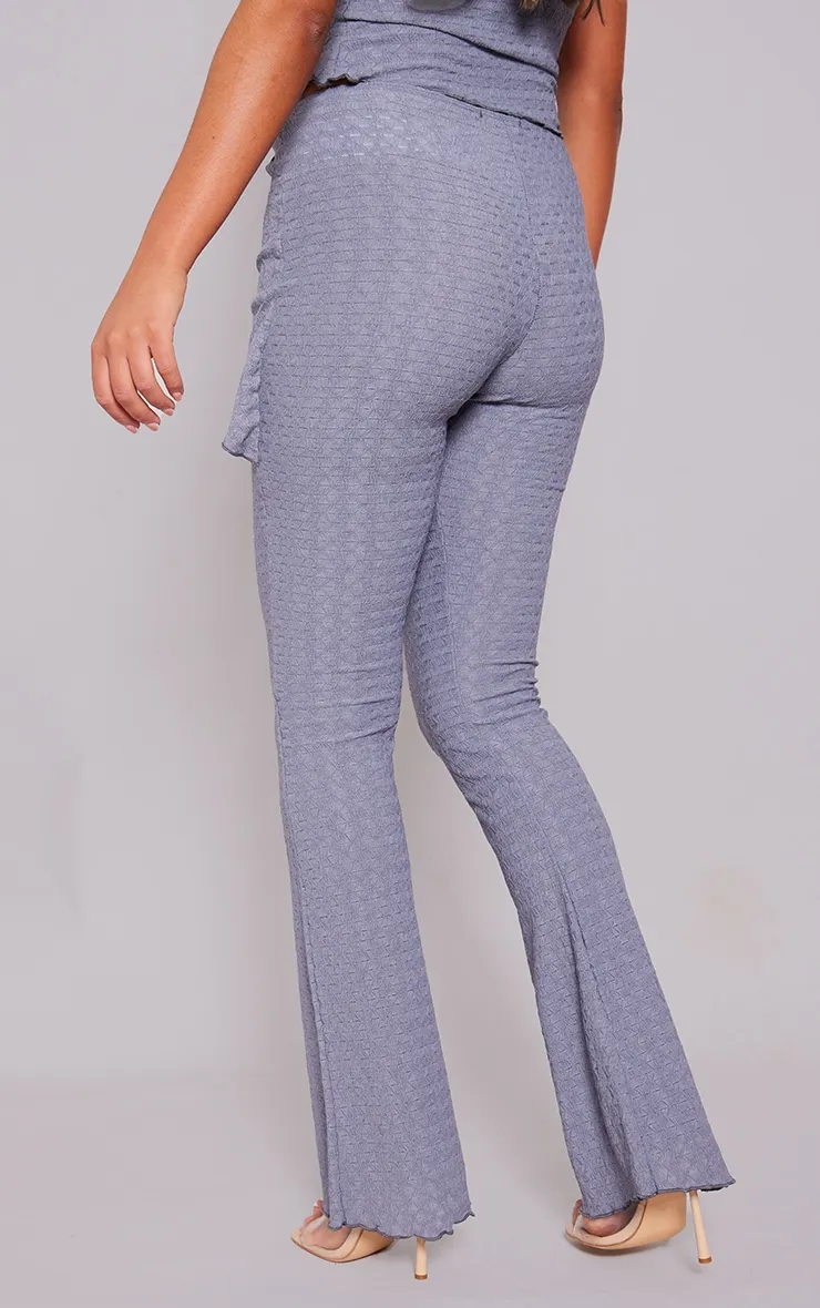 Charcoal Textured Asymmetric Flare Trousers sold by Pretty Little Thing product image thumbnail 3