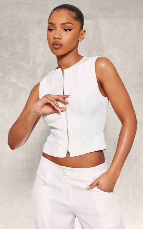 Cream Premium Woven Zip Up Detail Sleeveless Top sold by Pretty Little Thing