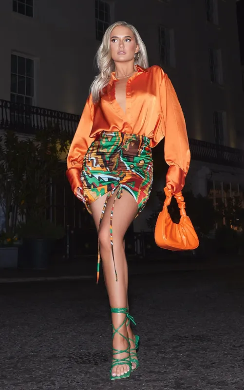 Multi Abstract Print Ruched Front Skirt sold by Pretty Little Thing