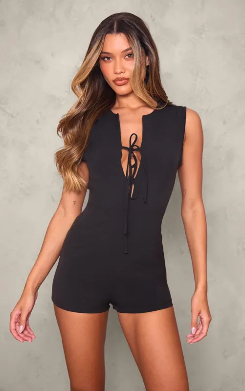 Black Woven Tie Front Tailored Playsuit sold by Pretty Little Thing