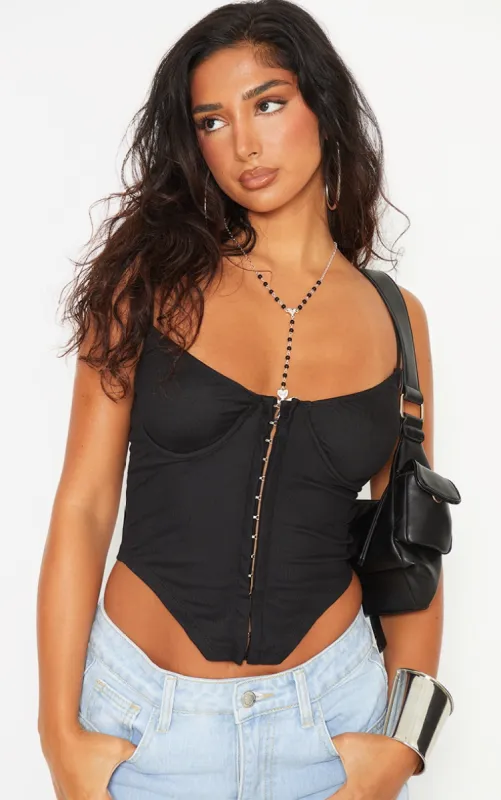 Petite Black Mesh Hook And Eye Corset sold by Pretty Little Thing