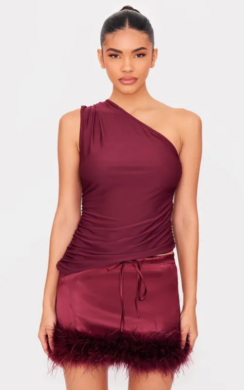 Burgundy Asymmetric Ruched Side Longline Top sold by Pretty Little Thing