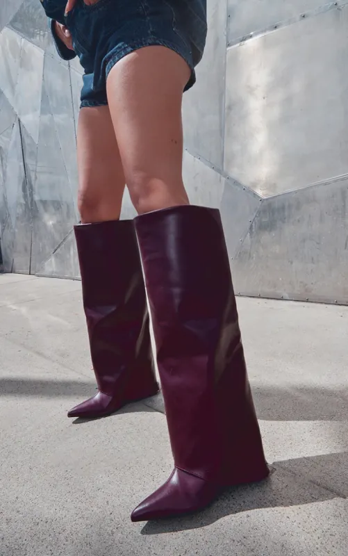 Wide Fit Burgundy PU Fold Over Zip Detail Point Toe Knee High Wedge Heeled Boots sold by Pretty Little Thing