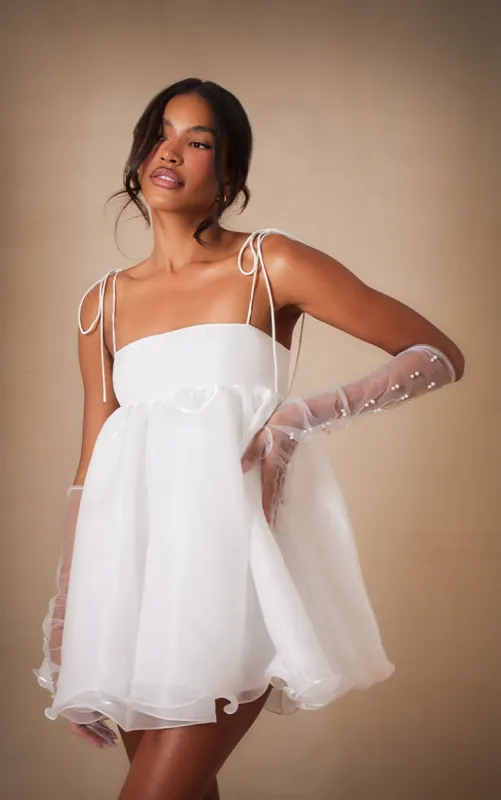 Premium White Chiffon Strappy Mini Dress sold by Pretty Little Thing
