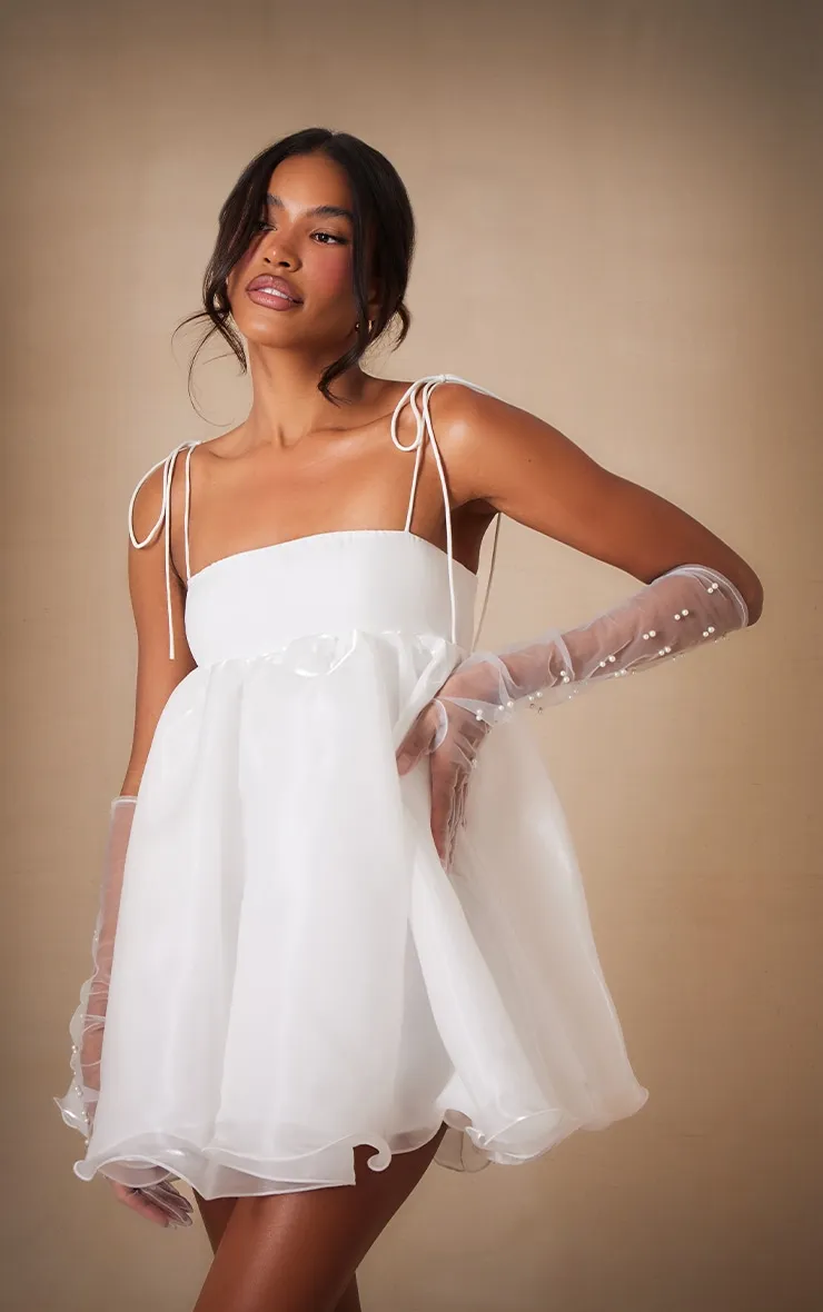Premium White Chiffon Strappy Mini Dress sold by Pretty Little Thing