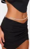 Black Woven Layered Diamante Micro Mini Skirt sold by Pretty Little Thing
