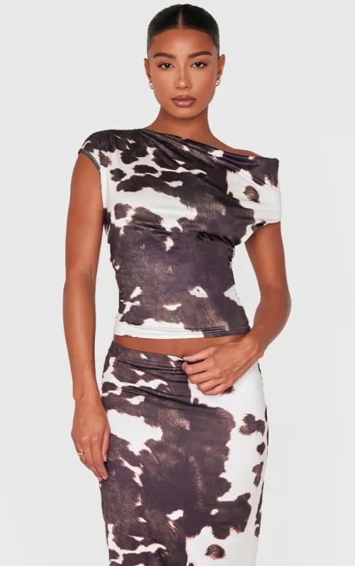 Brown Slinky Backless Cow Print Asymmetric Long Top sold by Pretty Little Thing