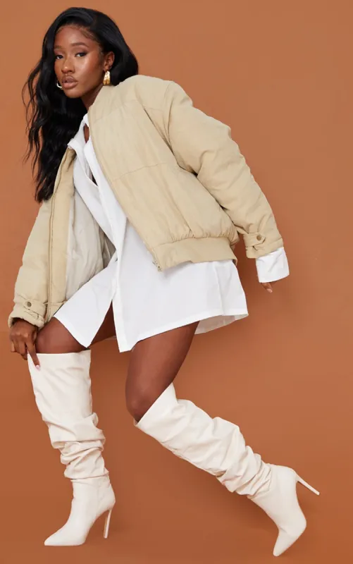 Cream Faux Leather Slouch Over The Knee Boots sold by Pretty Little Thing