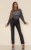 Black Faux Leather V Front Straight Leg Trousers sold by Pretty Little Thing