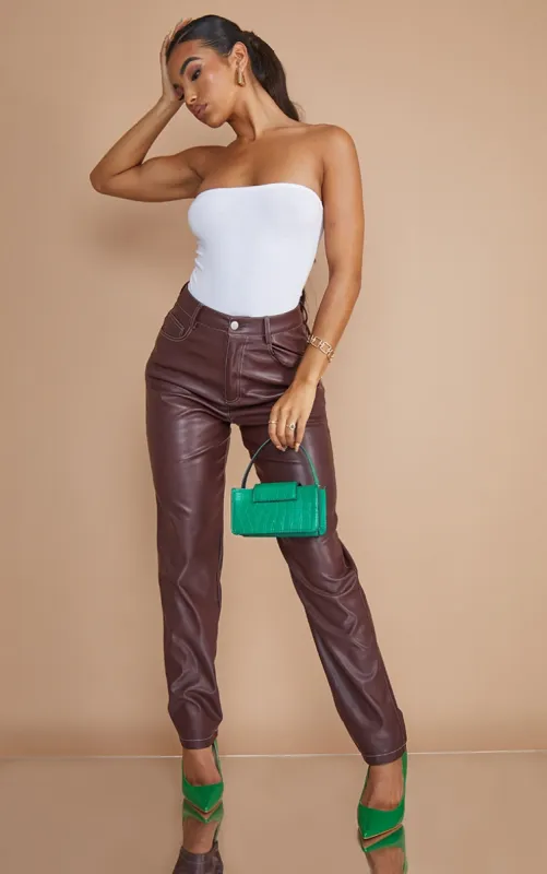 Dark Chocolate Faux Leather Contrast Stitch Straight Leg Trousers sold by Pretty Little Thing