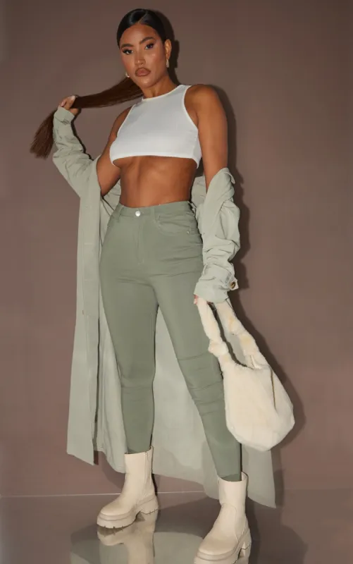 Sage Green Hourglass Coated Skinny Jeans sold by Pretty Little Thing