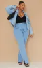 Plus Light Blue Wash Split Hem Jeans sold by Pretty Little Thing