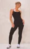 Black Ribbed Knitted Strappy Jumpsuit sold by Pretty Little Thing