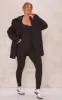 Black Ribbed Knitted Strappy Jumpsuit sold by Pretty Little Thing