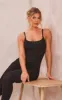 Black Ribbed Knitted Strappy Jumpsuit sold by Pretty Little Thing