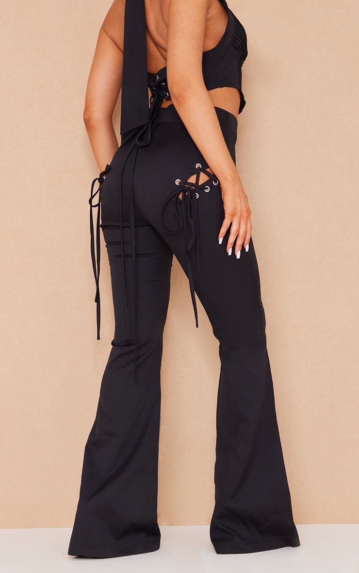 Black Woven Cut Out Flare Trousers sold by Pretty Little Thing product image thumbnail 3