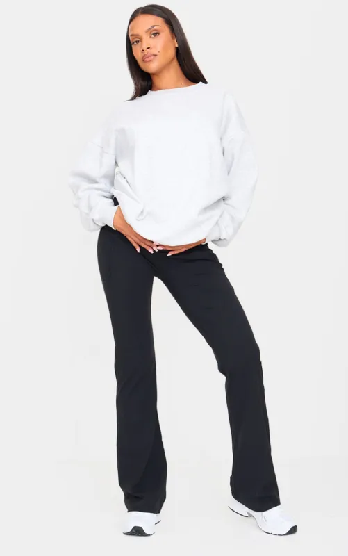 Maternity Black Contour Sculpt Pocket Flared Leggings sold by Pretty Little Thing