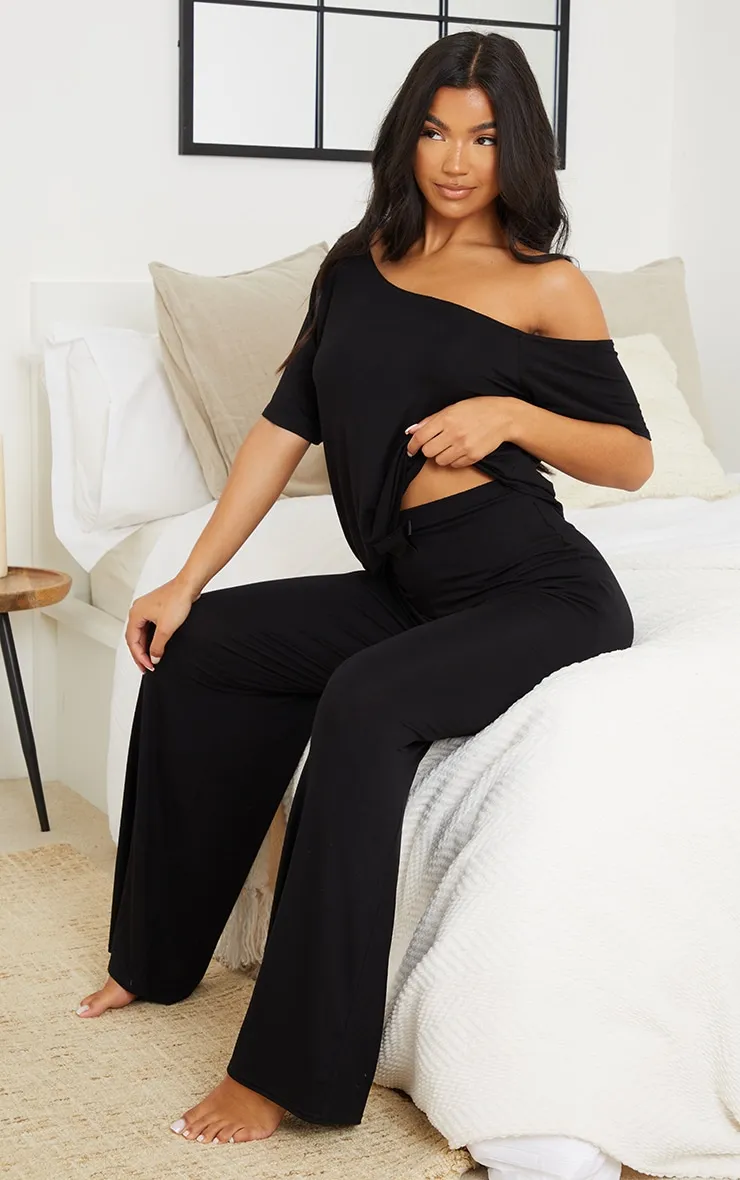 Black Off The Shoulder Top & Bottoms PJ Set sold by Pretty Little Thing