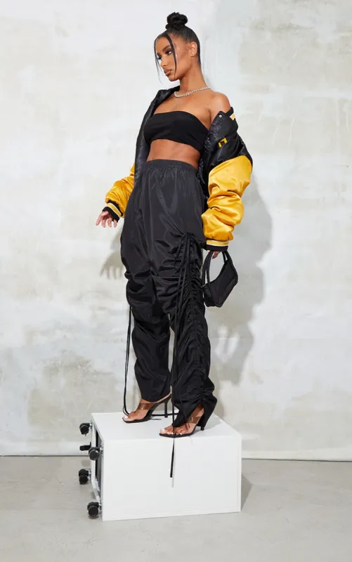 Black Shell Ruched Leg Joggers sold by Pretty Little Thing