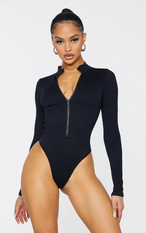 Black Contour Rib Zip Up Long Sleeve Bodysuit sold by Pretty Little Thing