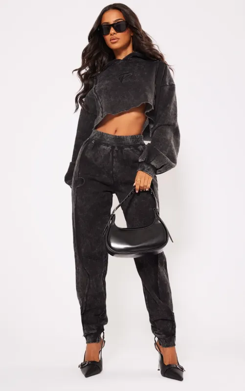 Petite Black Acid Wash Seam Detail Cuffed Joggers sold by Pretty Little Thing