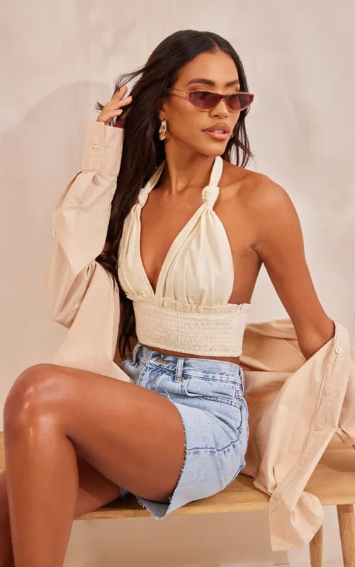 Cream Linen Feel Knot Detail Halter Crop Top sold by Pretty Little Thing