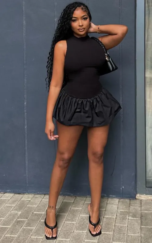 Black Rib Puff Ball Hem Bodycon Dress sold by Pretty Little Thing