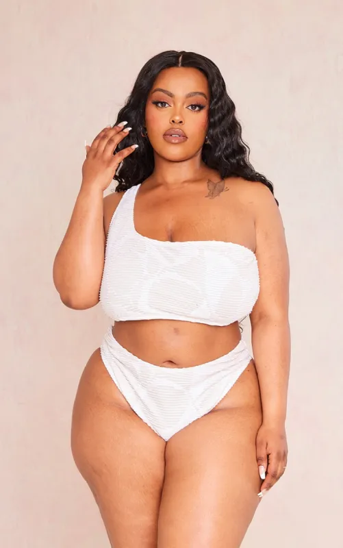 Plus Cream Textured One Shoulder Bikini Top sold by Pretty Little Thing