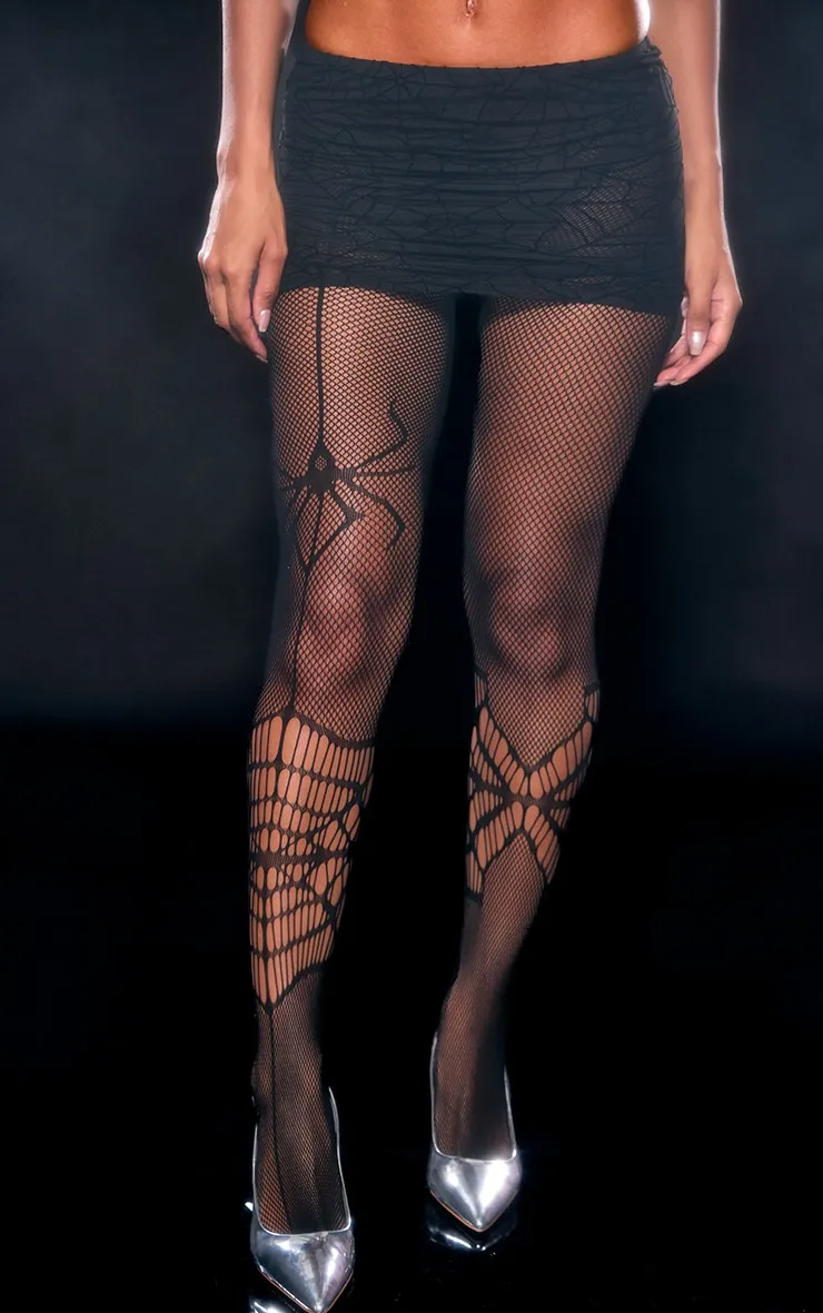 Black Spider Fishnet Tights sold by Pretty Little Thing