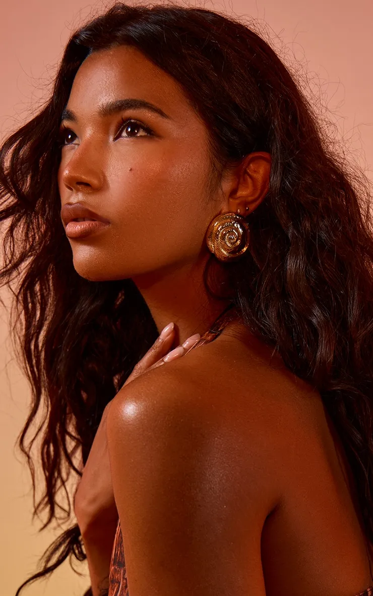 Gold Molten Swirl Statement Stud Earrings sold by Pretty Little Thing