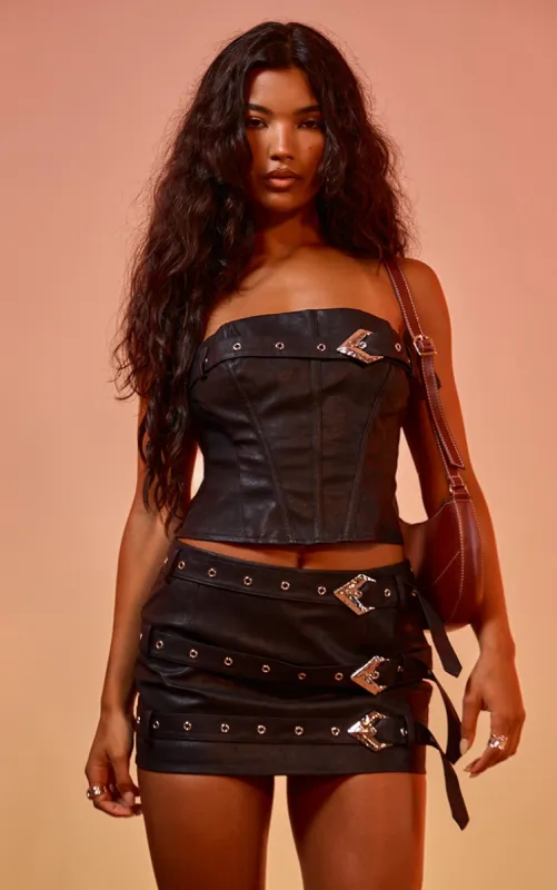 Washed Black Faux Leather Belt Detail Corset sold by Pretty Little Thing