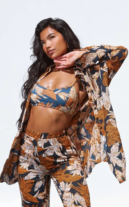 Black Palm Leaf Print Beach Shirt sold by Pretty Little Thing