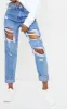 PRETTYLITTLETHING Tall Mid Blue Ripped Mid Rise Mom Jeans sold by Pretty Little Thing