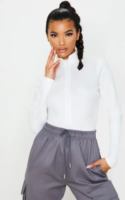 White Bonded Scuba High Neck Zip Bodysuit sold by Pretty Little Thing