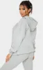 Grey Oversized Pocket Front Drawstring Hoodie sold by Pretty Little Thing