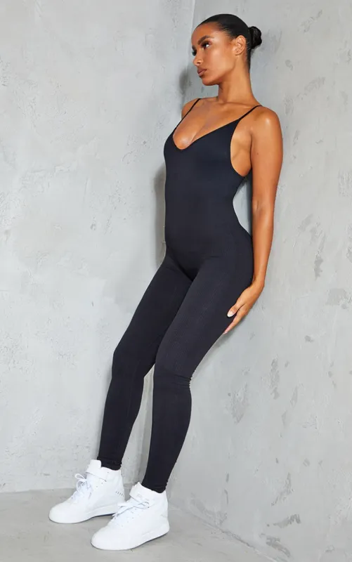 Black Structured Contour Rib Strappy Plunge Jumpsuit sold by Pretty Little Thing