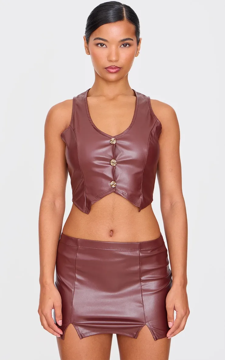 Chocolate Faux Leather Cropped Waistcoat sold by Pretty Little Thing