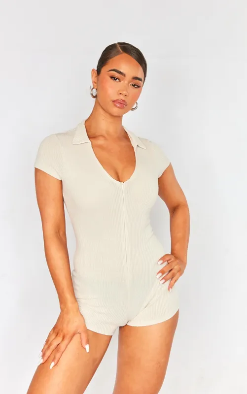 Cream Ribbed Jersey Zip Up Collar Playsuit sold by Pretty Little Thing