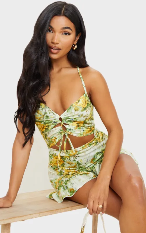 Yellow Floral Print Cut Out Frill Hem Halterneck Shift Dress sold by Pretty Little Thing