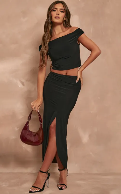 Black Slinky Low Rise Split Front Midaxi Skirt sold by Pretty Little Thing