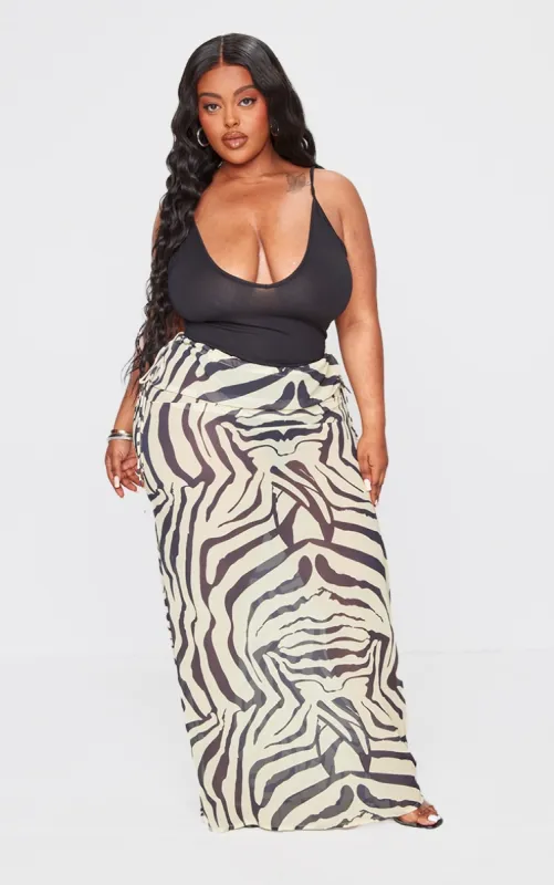 Plus Black Zebra Print Satin Tie Side Maxi Skirt sold by Pretty Little Thing
