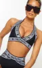 Black PRETTYLITTLETHING Strap Triangle Bikini Top sold by Pretty Little Thing