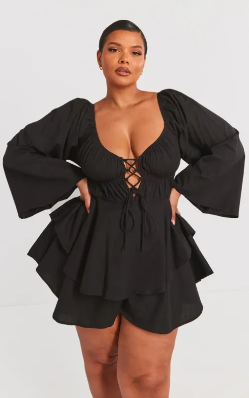 Plus Black Lace Up Long Sleeve Playsuit sold by Pretty Little Thing