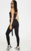 Black Basic Strappy Jumpsuit sold by Pretty Little Thing