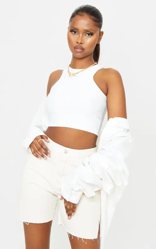 White Stretch Slinky Racer Crop Top sold by Pretty Little Thing