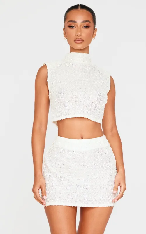 Petite Cream Shoulder Pad Detail Sleeveless Sequin Crop Top sold by Pretty Little Thing