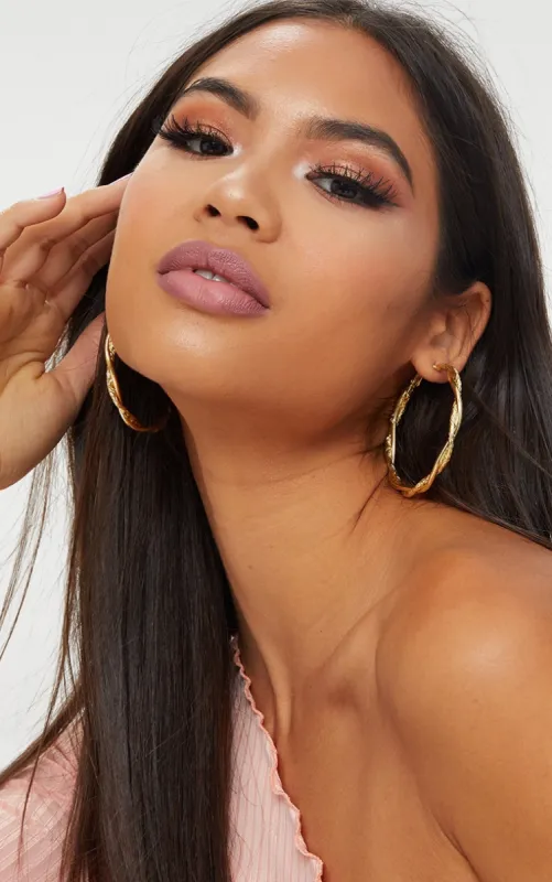 Gold Twisted Hoop Earrings sold by Pretty Little Thing