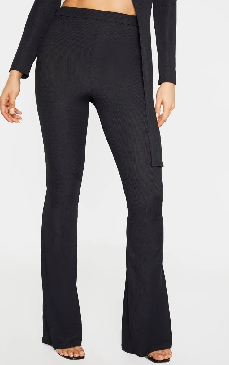 Tall Black Ribbed Flared Trousers sold by Pretty Little Thing product image thumbnail 2